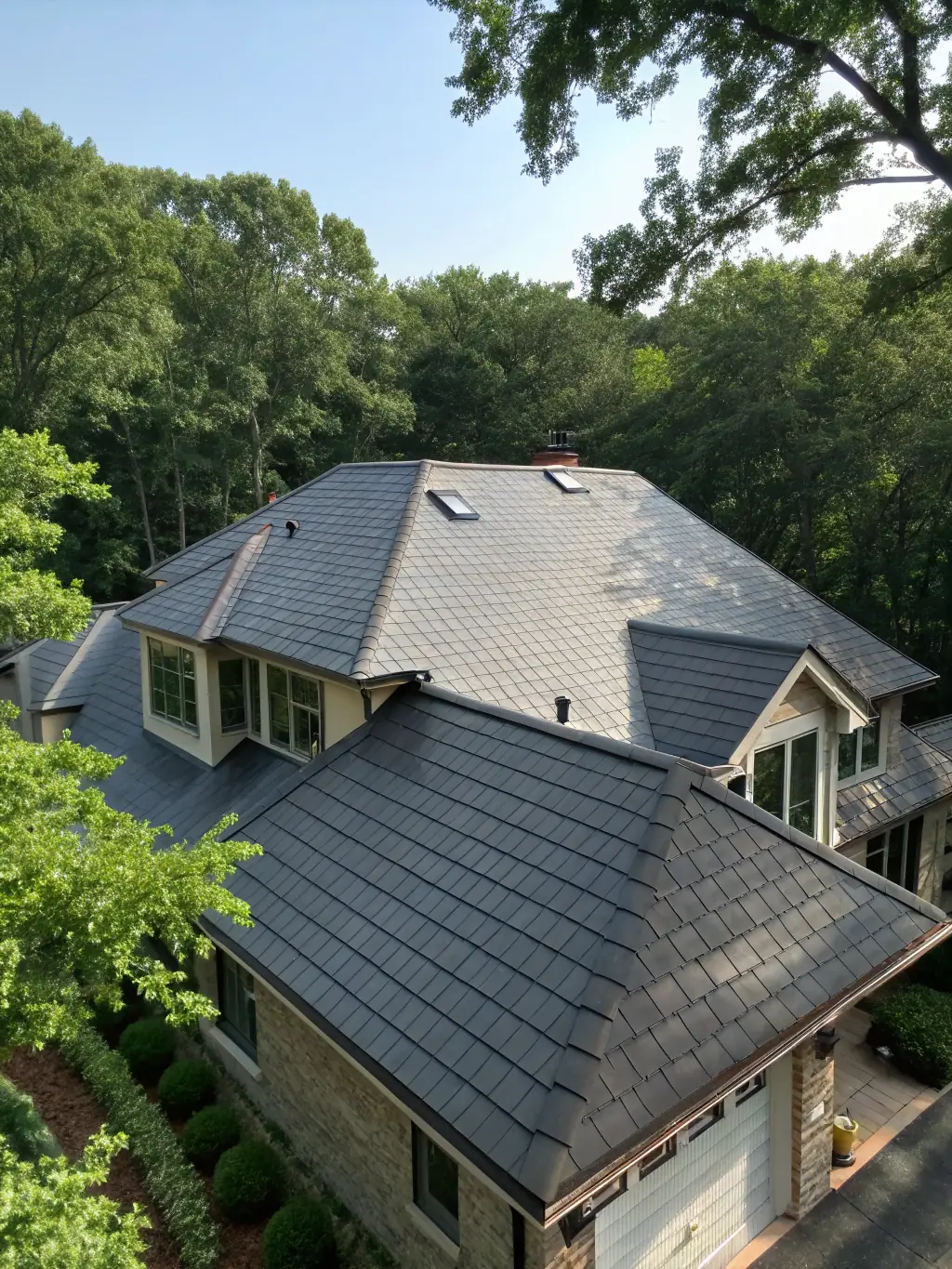 An image of a residential home in Richmond, VA, featuring a newly installed asphalt shingle roof, showcasing its classic look and affordability.
